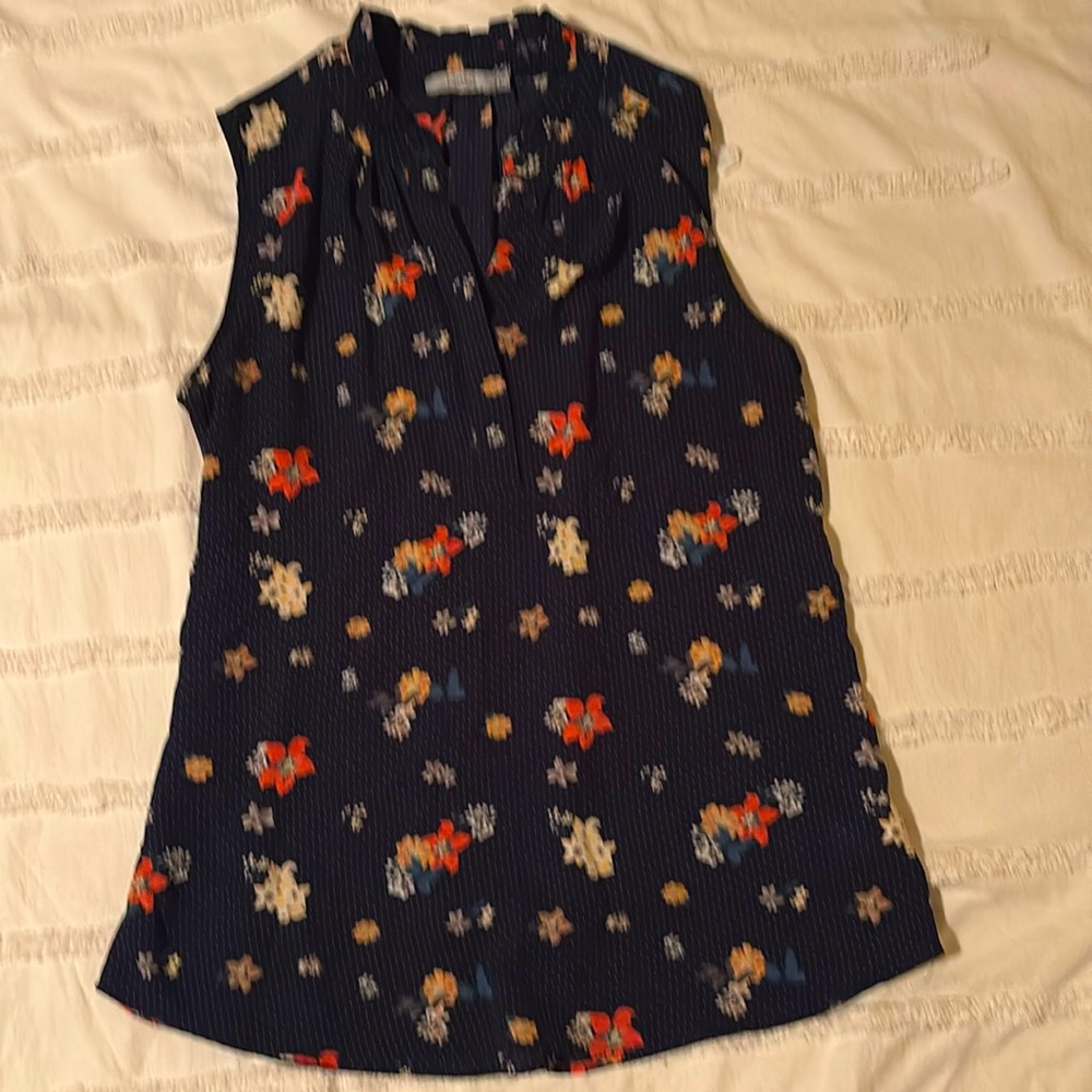 Dalia cap sleeve navy blue floral top.